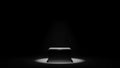 Dark Stage With Spotlight Illuminating A Single Metallic Cube Pedestal display Royalty Free Stock Photo