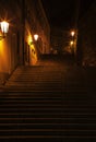 Dark staircase enlightened with lanterns in Prague