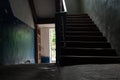 Dark staircase inside with a staircase to the second floor in an old house in Ukraine in the cities of Dnieper