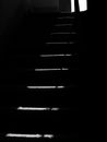 Dark stairway in ray of the light