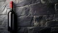 Dark stone backdrop with a bottle of red wine Royalty Free Stock Photo