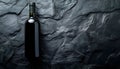 Dark stone backdrop with a bottle of red wine Royalty Free Stock Photo