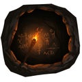 Dark Stone Cave with Glowing Torch Light and Ancient Symbols Carved on the Wall Royalty Free Stock Photo