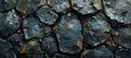 A dark stone surface with intricate patterns, deep cracks, and stunning geological features Royalty Free Stock Photo