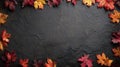 Dark Stone Surface with Vibrant Maple Leaves for Text Overlay Royalty Free Stock Photo