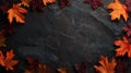 Dark Stone Surface with Vibrant Maple Leaves for Text Overlay Royalty Free Stock Photo