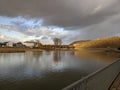 Dark storm clouds above the river moselle as seen from the shore