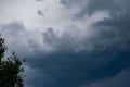 Dark storm clouds and gray gloomy clouds, a terrible natural phenomenon Royalty Free Stock Photo