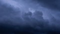 Dark storm clouds make the sky in black. Rain is coming soon. Nature background Royalty Free Stock Photo