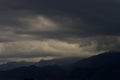 Turbulent storm clouds. Dark turbulent storm clouds over the front range mountains of Colorado Royalty Free Stock Photo