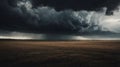 Dark Storm Clouds Over Open Field with Dramatic Sky Royalty Free Stock Photo