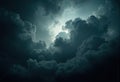 Dark storm clouds with sunlight breaking through, creating a dramatic sky scene Royalty Free Stock Photo