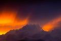 Dark storm clouds during sunset with dramatic sky and vibrant colors Royalty Free Stock Photo