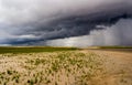 Dark storm clouds in the Wadden Sea at the North Sea Royalty Free Stock Photo