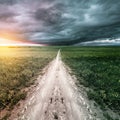 Dark stormy clouds above the road. Royalty Free Stock Photo