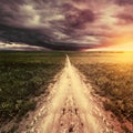 Dark stormy clouds above the road. Royalty Free Stock Photo