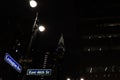 Dark street and street sign, New York Chrysler Building concept photo.