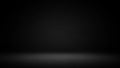 Dark studio background with spotlight on floor and subtle gradient black empty Royalty Free Stock Photo