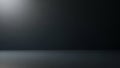 Dark Studio Background with Subtle Light Gradient and Floor Reflection Keywords: dark, studio, background, gradient Royalty Free Stock Photo
