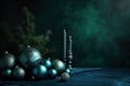 Dark stylish Christmas background with blue and silver Christmas balls. Festive background with lighted candles and a Christmas Royalty Free Stock Photo