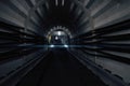 Dark subway tunnel with train