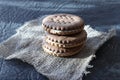Dark sugar cookies with cream filling. Delicious addition to tea or coffee for breakfast