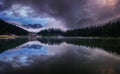 Dark sunrise at the Misurina lake in the Dolomits mountains