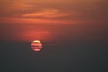 dark sunset back on silhouette red orange evening cloud and sky over horizon sea Royalty Free Stock Photo