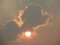In the dark sunset sky are taking golden red burning like fire behind the cloude color Royalty Free Stock Photo