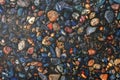 Asphalt texture mixed with colored stones