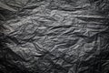 The dark texture of crumpled paper, black background Royalty Free Stock Photo