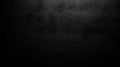 Dark background featuring diagonal lines and subtle texture variations visible Royalty Free Stock Photo