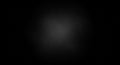 Dark textured background with a subtle spotlight effect in the center Royalty Free Stock Photo