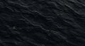 Granite Strength Dark Rock Background with Textural Depth Royalty Free Stock Photo