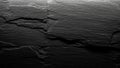Dark Textured Slate Stone Wall Surface with Subtle White Veining and Dramatic Lighting Effects Keywords: slate Royalty Free Stock Photo