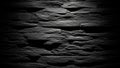 Dark Textured Stone Wall with Dramatic Lighting Creating Shadows and Highlights Keywords: stone, wall, texture, dark Royalty Free Stock Photo