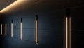 Dark textured wall with illuminated vertical light strips and subtle wood grain Royalty Free Stock Photo