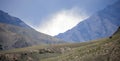 Dark thundercloud over a mountain pass before the weather worsens