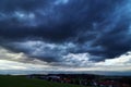 Dark thunderclouds over a small town