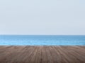 Dark timber foreground with sea scape background