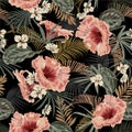 Dark tropical forest at night seamless pattern wallpaper vintage mood leaves of palm trees and exotic of flowers design for