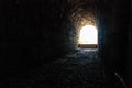 Dark tunnel with light. May symbolise to heaven, death, escape, exit, freedom Royalty Free Stock Photo