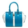 Dark turquoise glossy female handbag isolated on white background. Royalty Free Stock Photo