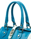 Dark turquoise glossy female handbag isolated on white background. Royalty Free Stock Photo