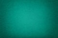 Dark turquoise matt suede fabric closeup. Velvet texture of felt Royalty Free Stock Photo