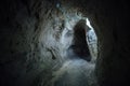 Dark underground passage of old chalky cave monastery Royalty Free Stock Photo