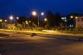 Dark urban illuminated city alley at night Royalty Free Stock Photo