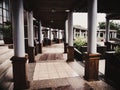 Dark view of corridor with classic pillars