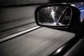 Left mirror car driving inside a tunnel Royalty Free Stock Photo