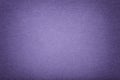 Dark violet matt suede fabric closeup. Velvet texture of felt Royalty Free Stock Photo